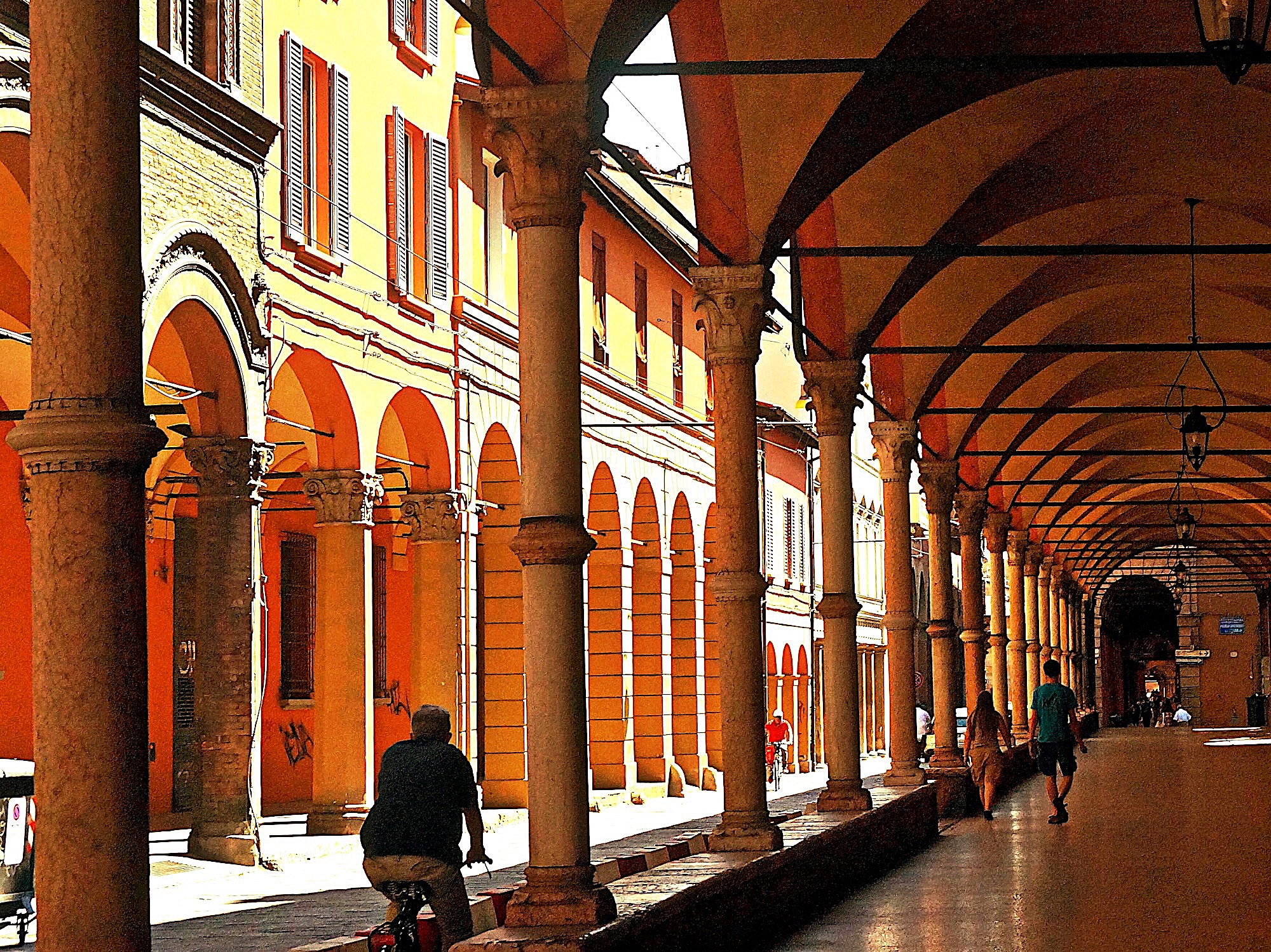 Bologna, Italy’s distinctive porticos shade cyclists and strollers as they travel around this ancient university city. 