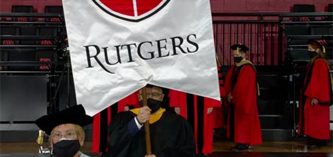 During the inauguration ceremony for Rutgers President Jonathan Holloway, Jon Oliver, who is assistant dean of information technology at SC&I and chair of the Rutgers University Senate, lead the procession to the stage, while carrying the Rutgers Gonfalon, an honor bestowed upon him as chair of the senate. 