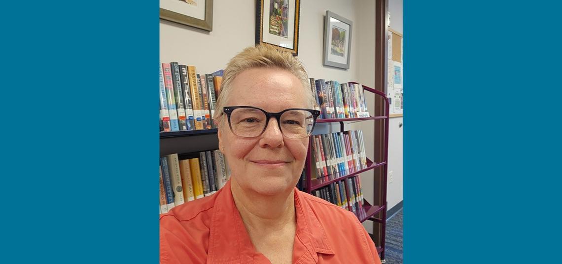 She’s also a good-humored, airplane-flying, novel-writing former opera singer who writes songs and plays the spoons. kathy_mulholland
