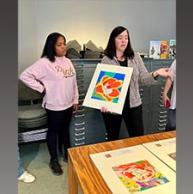  “Kayla Hebbon and Nicole Simpson with Art from Thumbelina,” photo by Amy Jordan